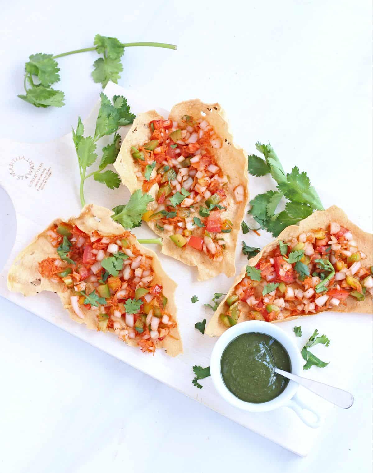 masala papad appetizer with cilantro and green chutney